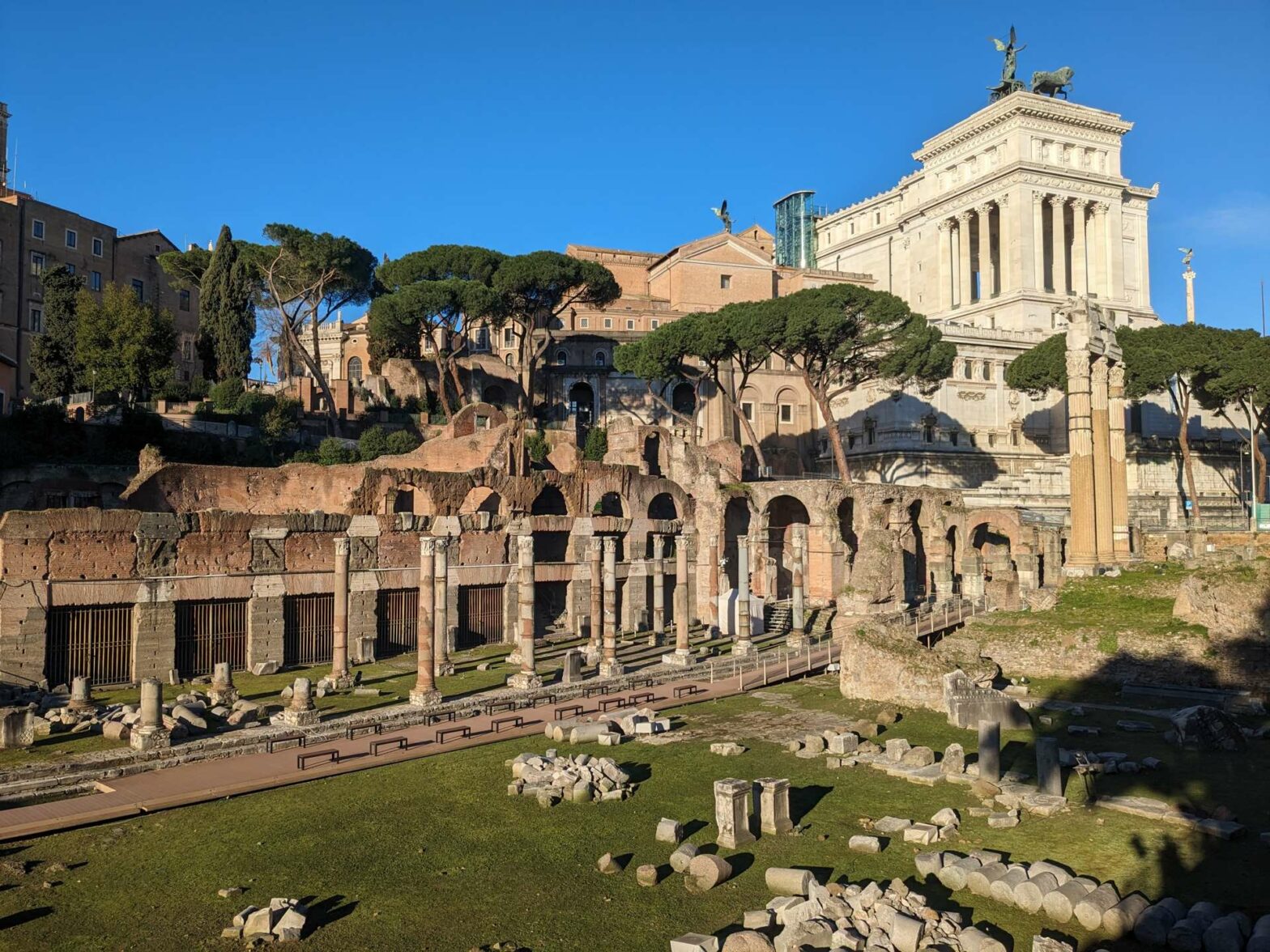 Walking through the heart of Ancient Rome with a view of the Roman Forum and the Monument to Victor Emmanuel II