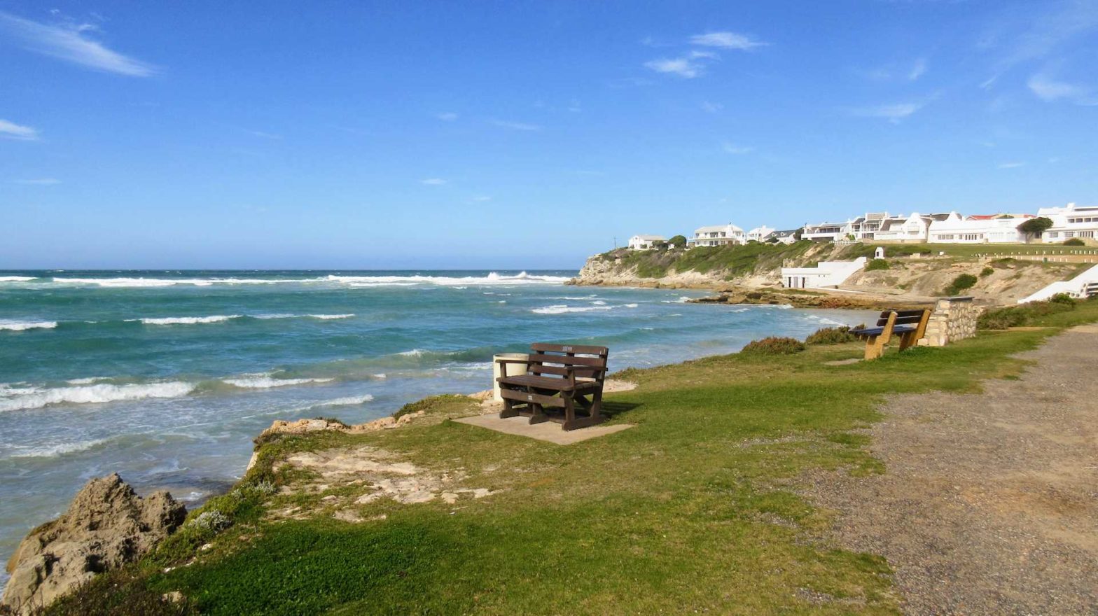 Arniston and a bench overlooking the sea.